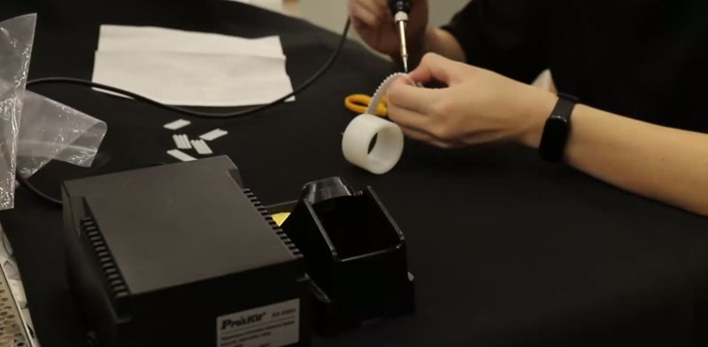 Bonding a scale to the base layer with a soldering iron